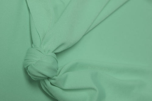 AT248 – Illusion – PBT Polyester Jersey | EBI Fabrics